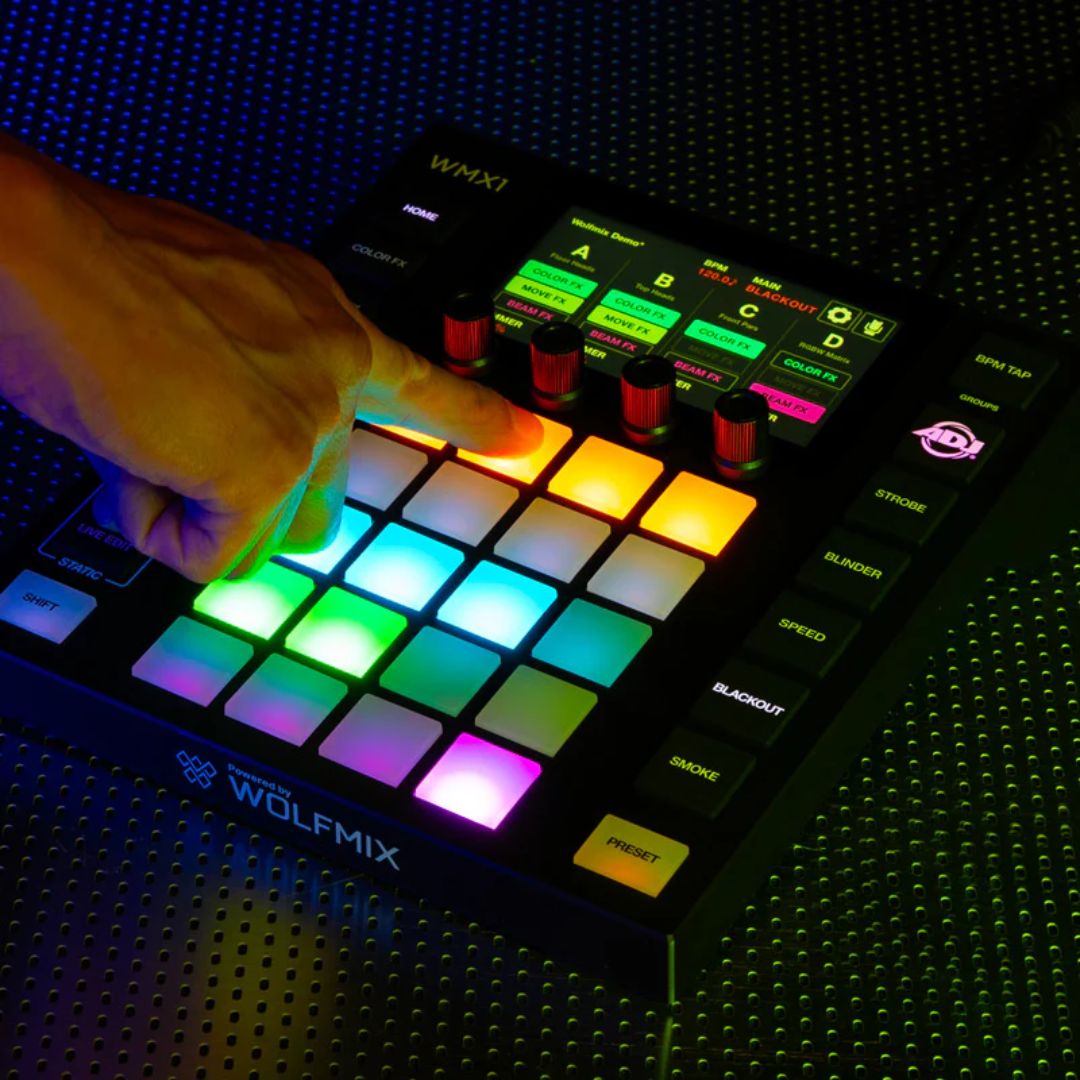 Angled front view of ADJ WMX1 Mk2 DMX Lighting Controller being played on textured surface