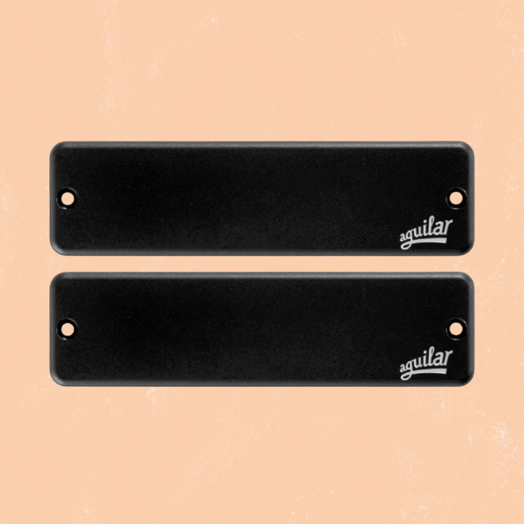 Front view of Aguilar DCB-D4 Dual Ceramic Bar 6-String Bar Bass Pickup Set on orange background