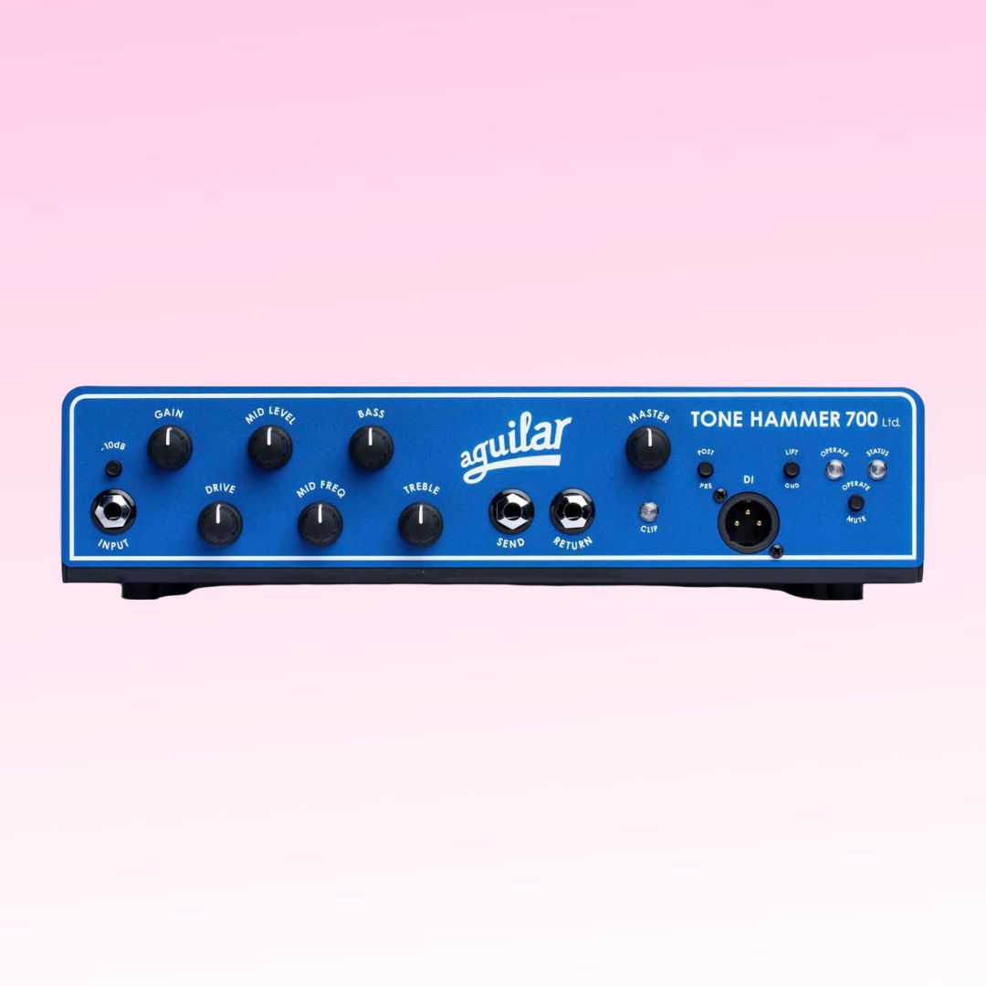 Front view of Aguilar Tone Hammer 700 Limited Edition Blue Bronco Bass Amp Head on pink background