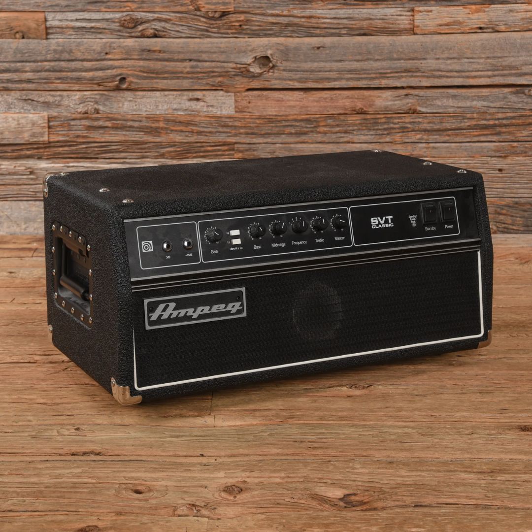 Angled front view of Ampeg SVT-CL 300W Bass Amplifier Head in wooden room
