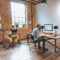 Drum recording in studio with studio engineer and drummer utilizing Audient ASP800