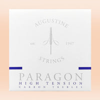 Augustine Strings Paragon High Tension Carbon Trebles packaging on a peach background