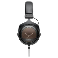 Side view of Beyerdynamic TYGR 300 R Open Gaming Headphones on white background