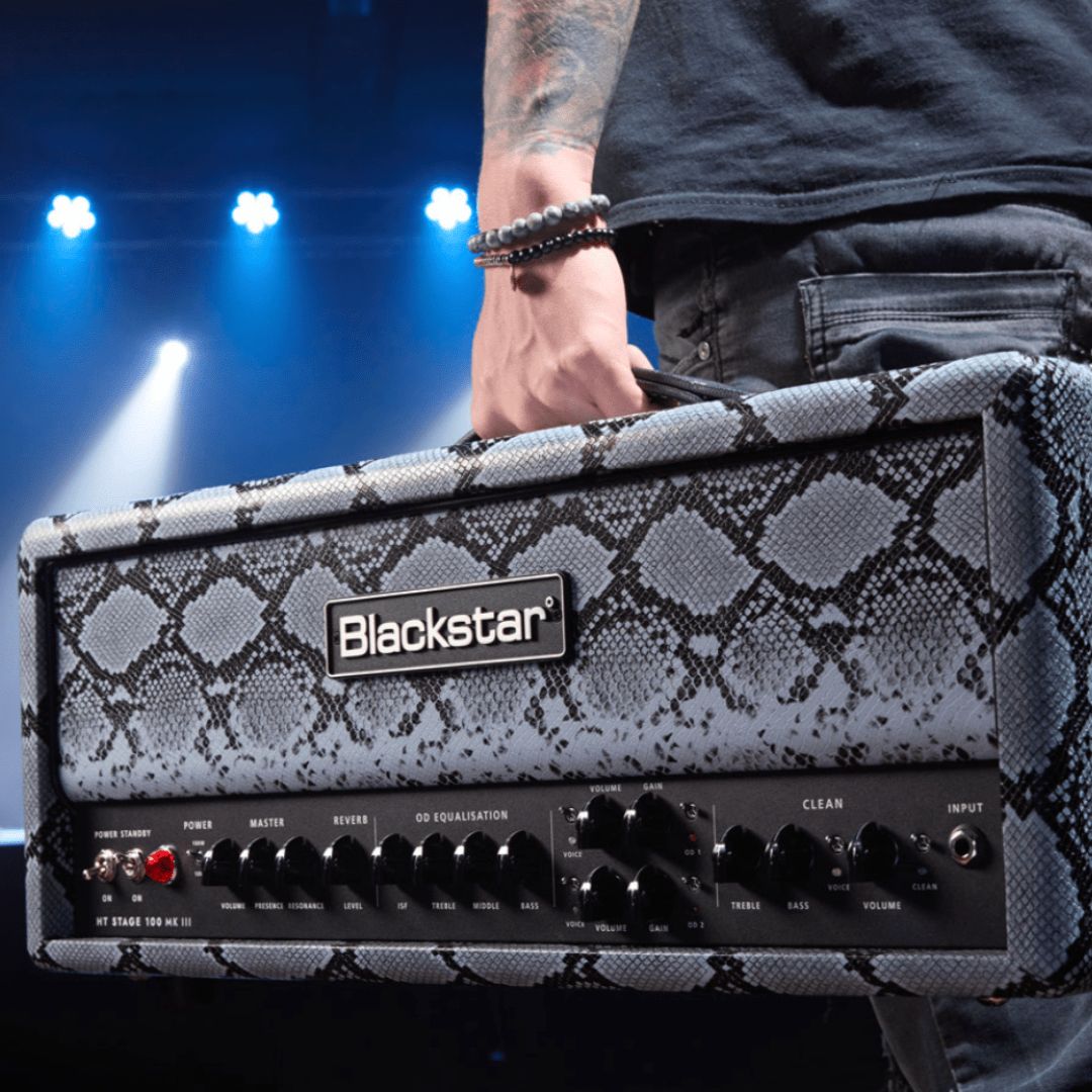 Guitarist carrying Blackstar HT Stage 100H MK III Guitar Amp Head Snakeskin in venue