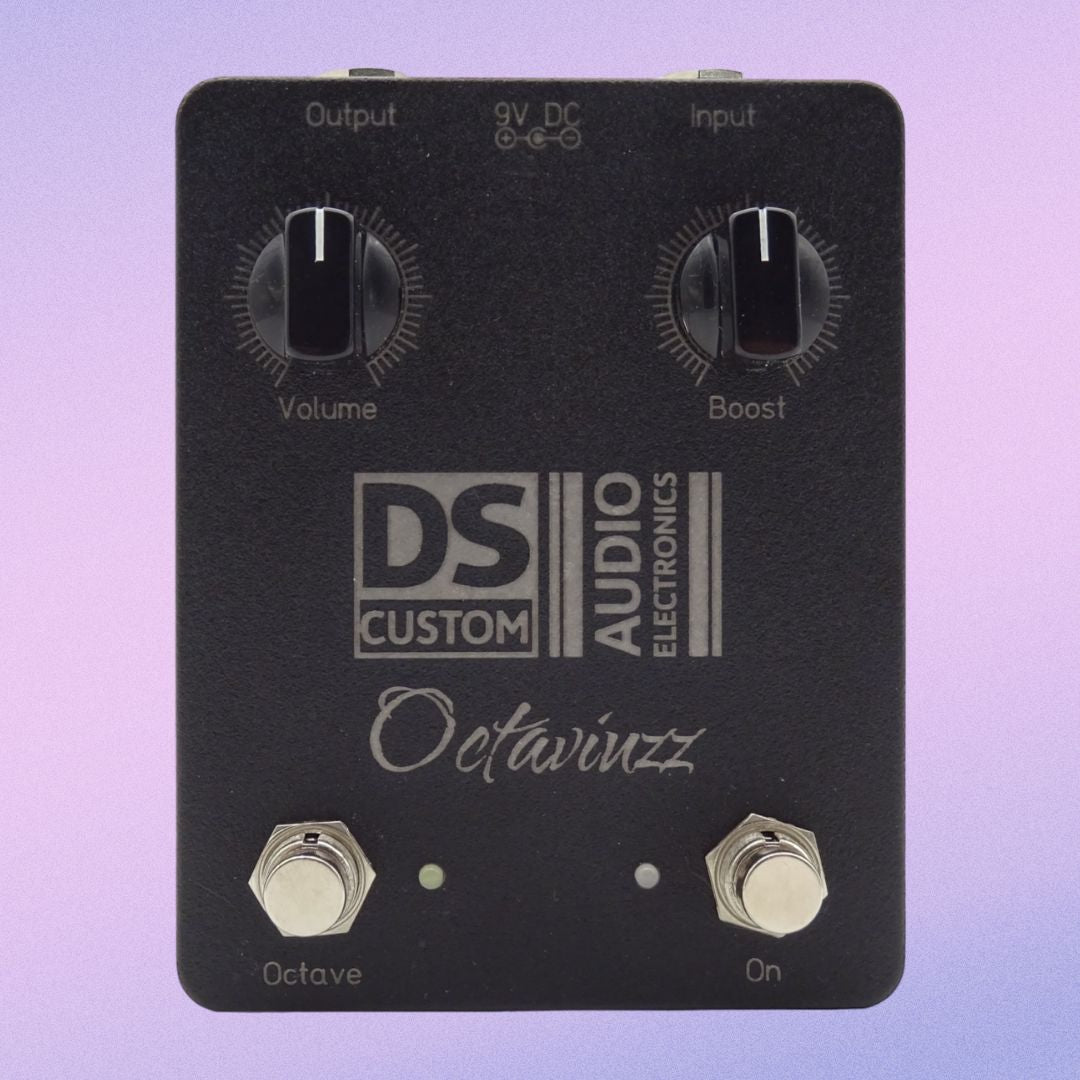 Front view of DS Custom Octaviuzz Pedal on purple background
