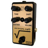 Angled front view of Dirty Haggard SQRT Pedal Black & Gold on white background
