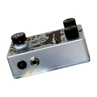 Angled side view of Flattley Poison Ivy Octave Harmonic Fuzz Pedal on white background