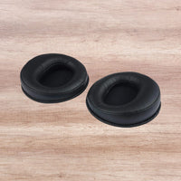 Angled front view of Fostex EX-EP-61 Replacement Ear Pads for TH610/TH616 (Pair) on wooden surface