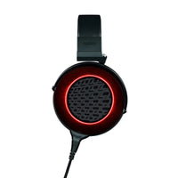 Side view of Fostex TH-909 Premium Open-Back Stereo Headphones w/ Headphone Stand on white background