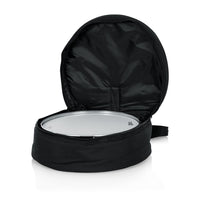 Black drum bag with a silver drum inside on a white background