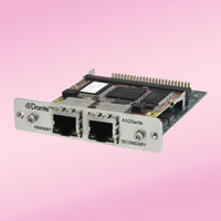 Angled front view of Grace Design 32-Channel Dante I/O for m701 on pink background