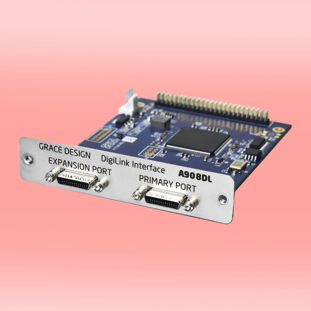 Angled front view of Grace Design 32-Channel Digilink Option for m908 on pink background