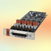Angled front view of Grace Design 4-Channel Mic Preamp for m701 on yellow and orange background