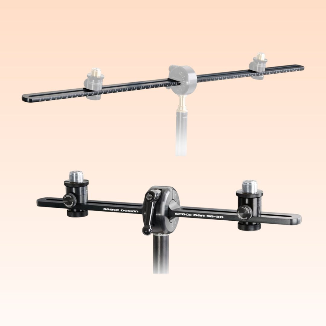 Angled front view of the Grace Design SB-30/66 Spacebar Stereo Microphone Mounting Kit on orange background