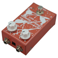 Angled top ports view of MMK Electrics Three Ptarmigan Pedal on white background