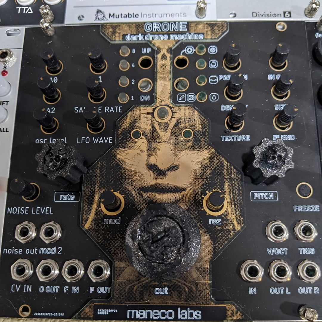 Front view of Maneco Labs Grone Drone Synth Module with other eurorack modules around it