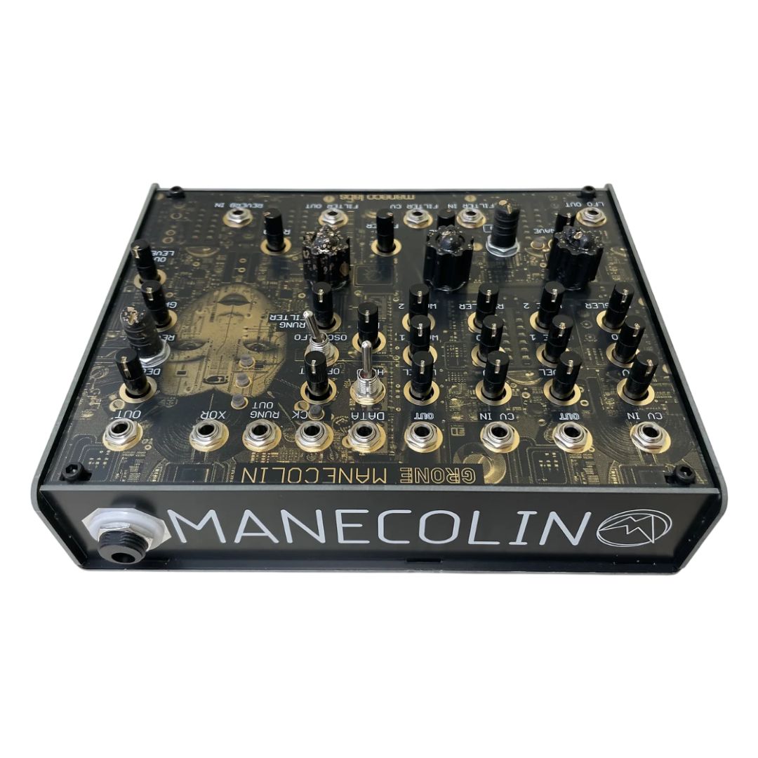 Angled top jack view of Maneco Labs Manecolin Table Top Synth on white background