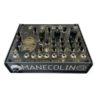 Angled top jack view of Maneco Labs Manecolin Table Top Synth on white background