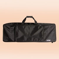 Front view of On-Stage 61-Key Keyboard Bag on orange background