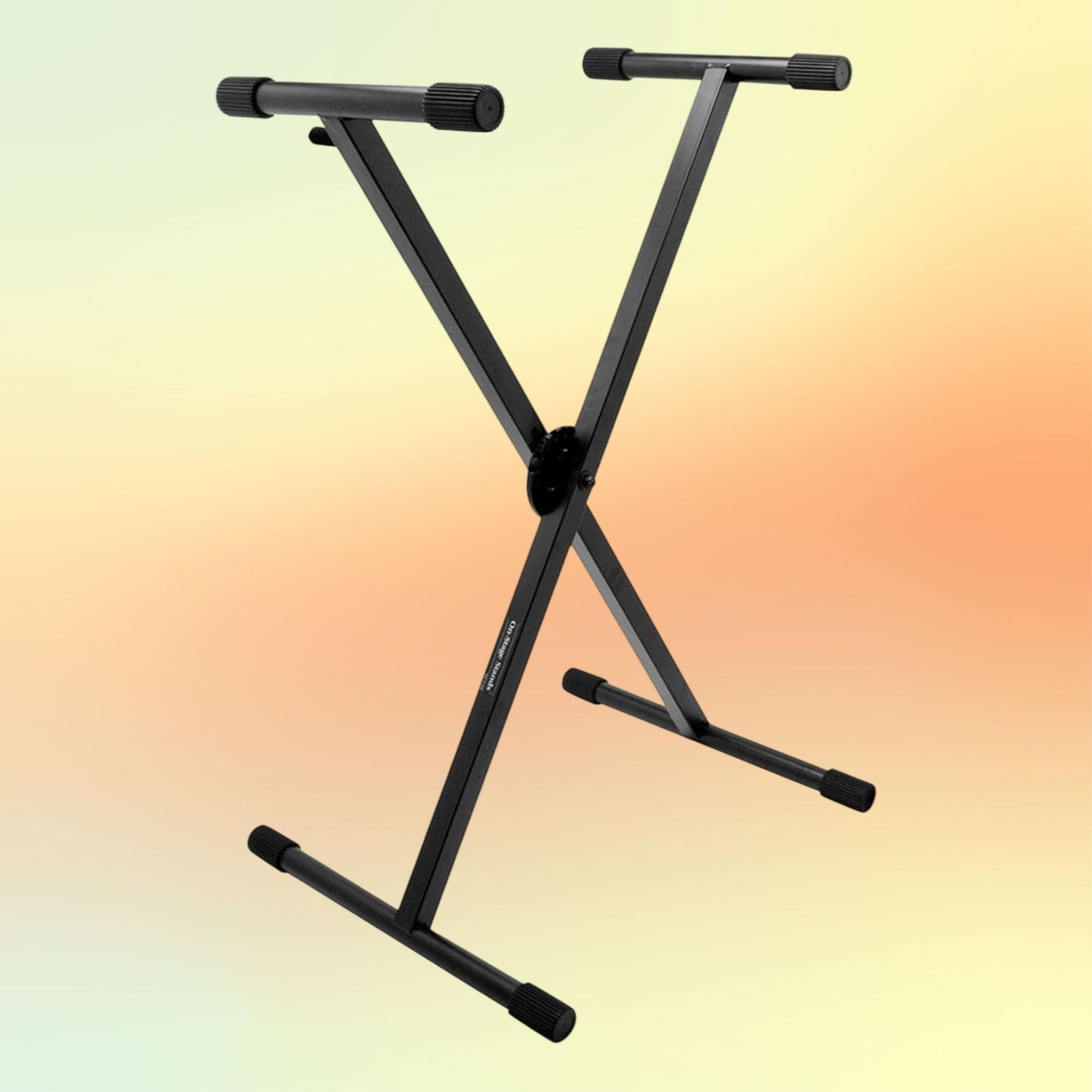 Angled view of On-Stage ERGO-LOK Single-X Keyboard Stand with Welded Construction on yellow and orange background