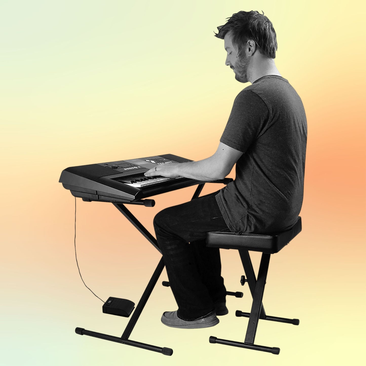 Pianist playing the keys while utilizing the On-Stage Keyboard Stand and Bench Pack with Keyboard Sustain Pedal on yellow and orange background