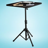 Angled view of On-Stage Percussion Table with different percussion instruments on it on blue background