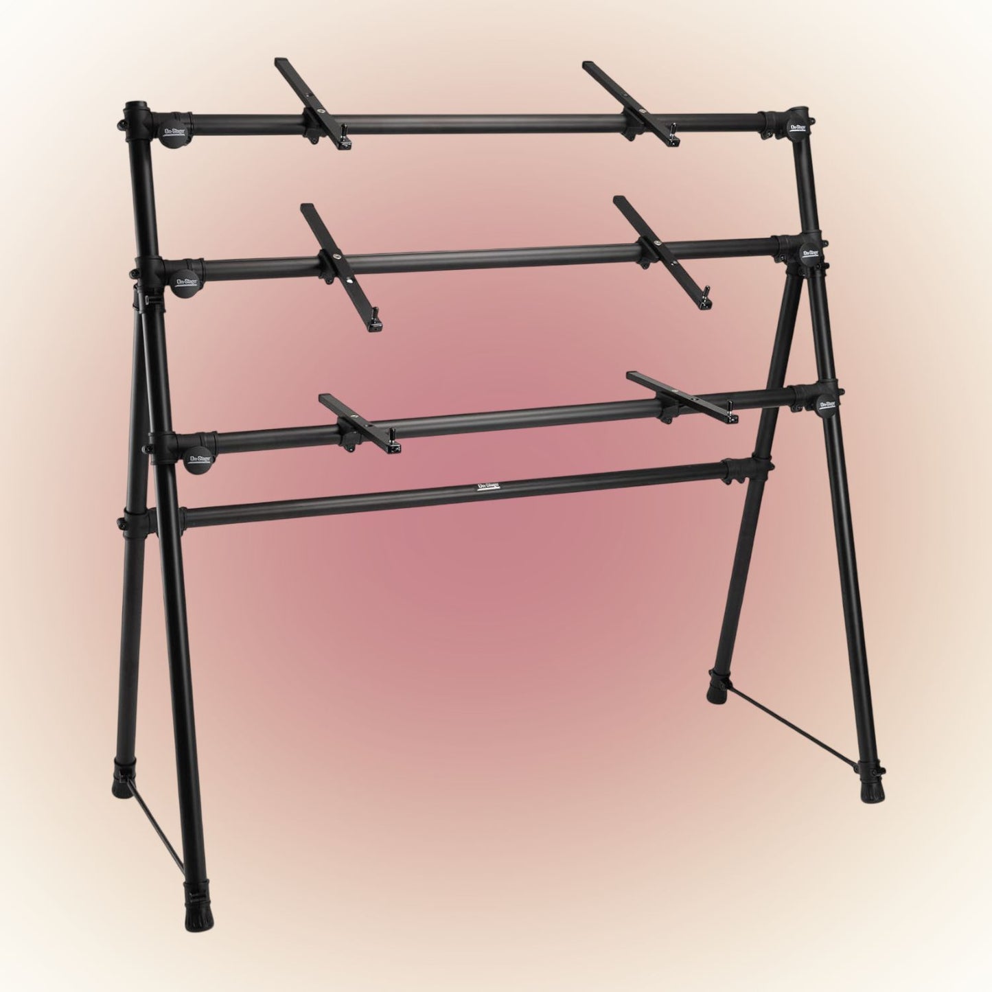 Angled front view of On-Stage Three-Tier A-Frame Keyboard Stand on maroon background