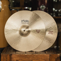 Front view of Paiste 15" Formula 602 Classic Medium Hi-Hats on wooden crate in studio