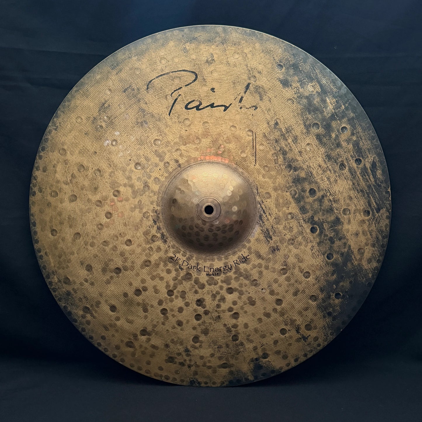 Front view of Paiste 21" Signature Dark Energy Ride Mark I Cymbal on black cloth
