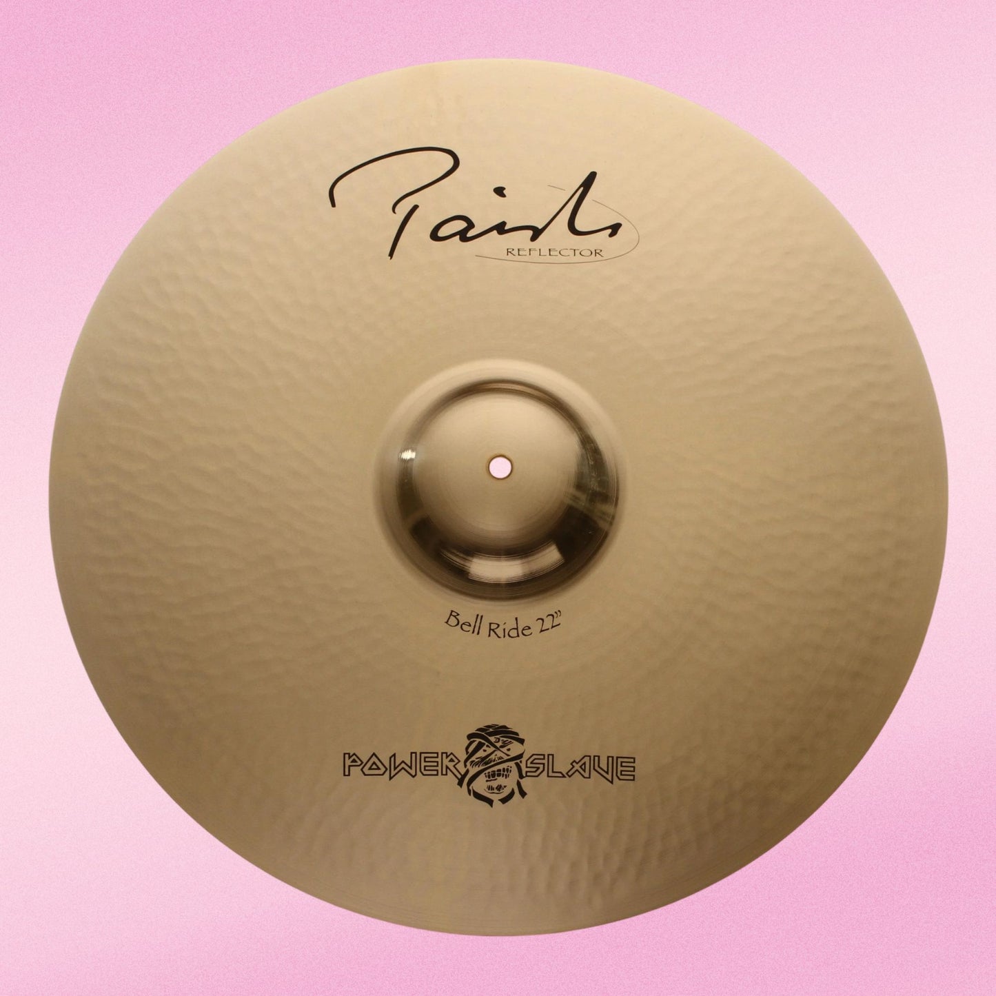 Front view of Paiste 22" Signature Reflector Bell Ride “Powerslave” Cymbal on pink background