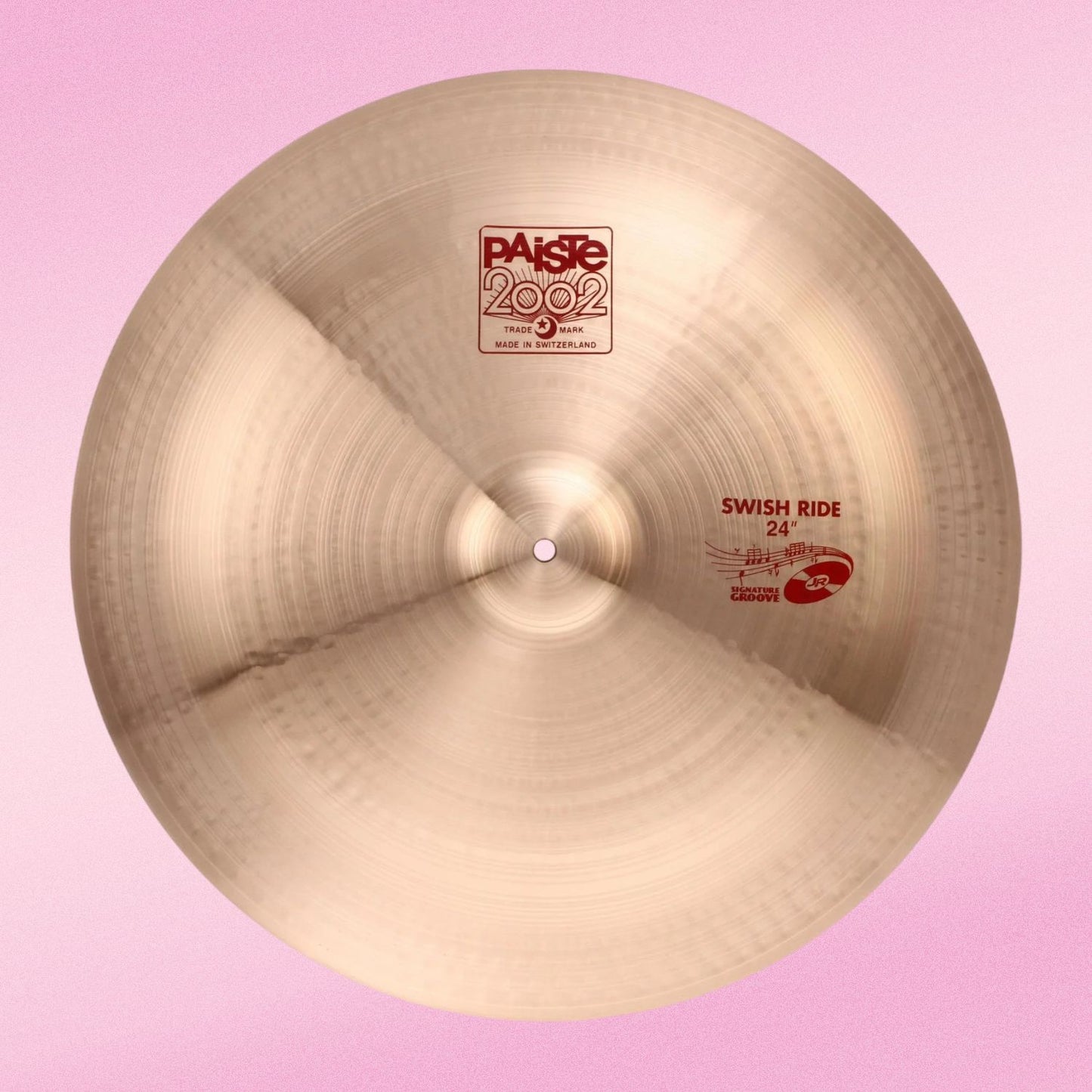 Front view of Paiste 24" 2002 Swish Ride Cymbal on pink background