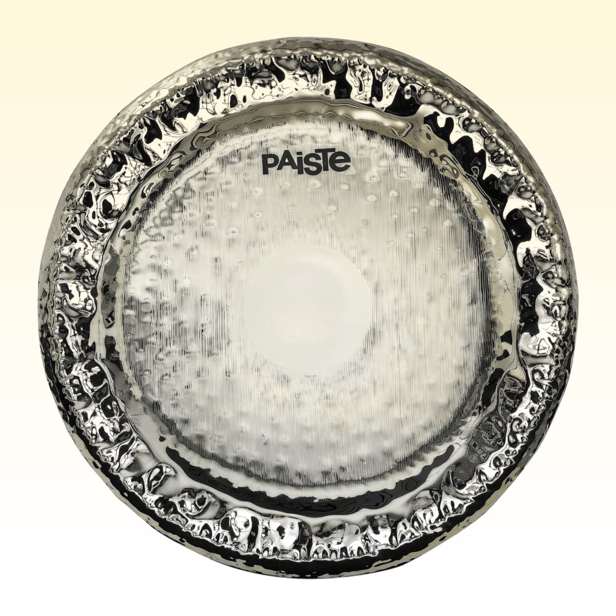 Front view of Paiste 24" Symphonic Gong Brilliant on yellow background