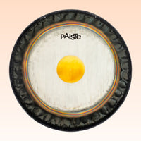 Front view of Paiste 34" Symphonic Gong on orange background