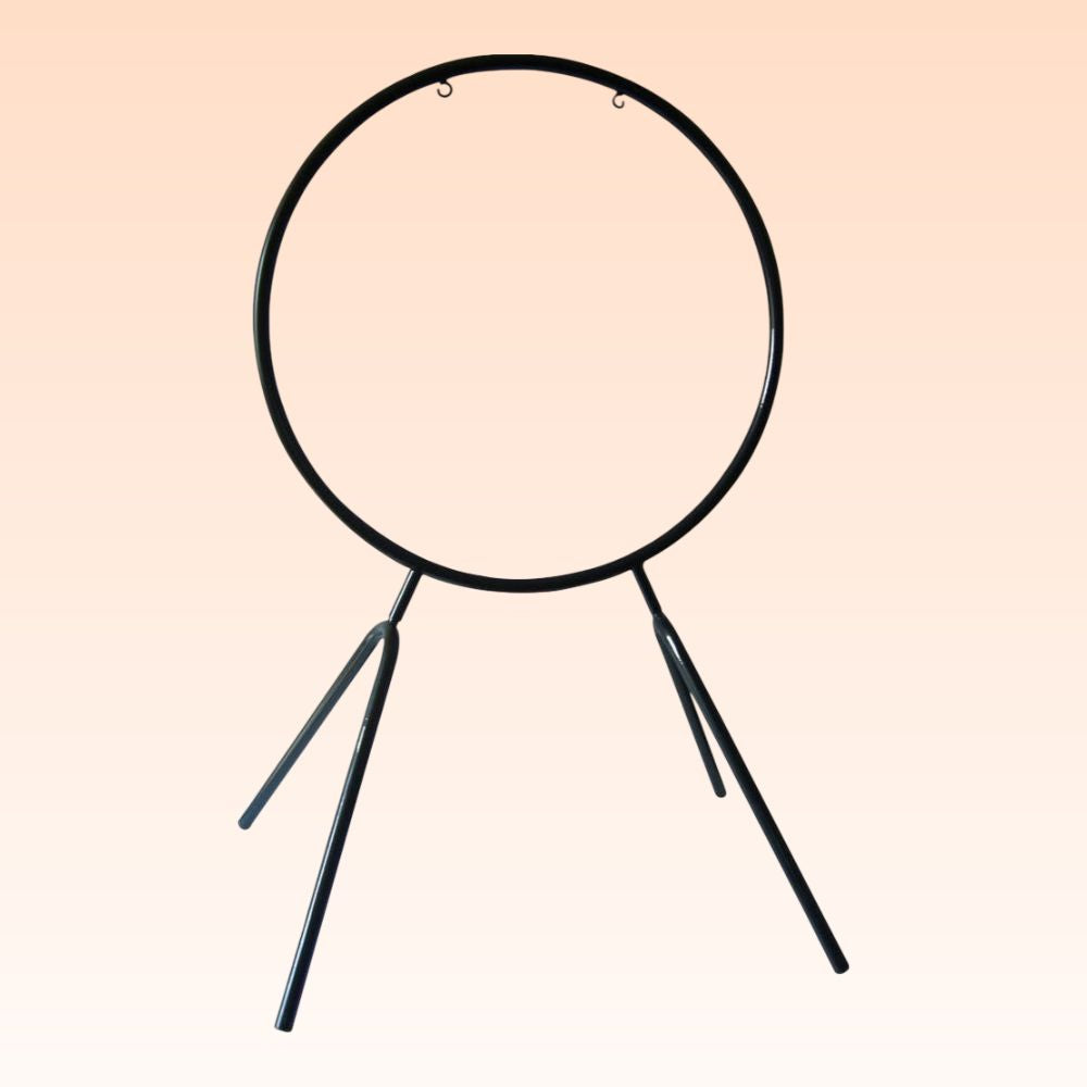 Front view of Paiste Round Orchestra Stand 28 on orange background