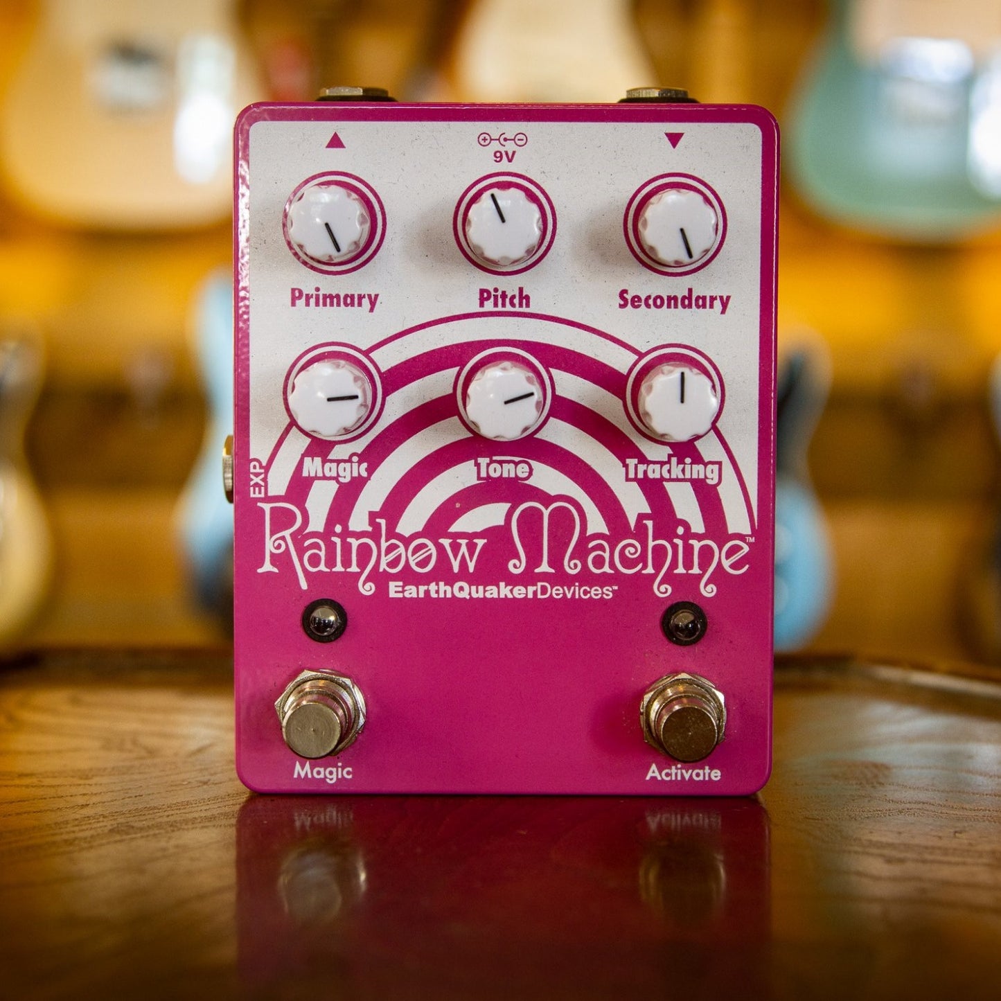 EarthQuaker Devices Rainbow Machine Pedal On a Wooden Table