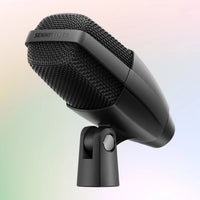 Angled view of Sennheiser MD 421 KOMPAKT Microphone on multicolored background
