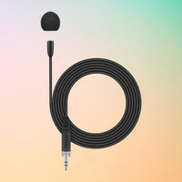 Coiled view of Sennheiser MKE Essential Omnidirectional Microphone on orange gradient with purple and green accents background
