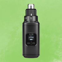 Front view of Shure SLXD3 Digital Plug-On XLR Transmitter on green background