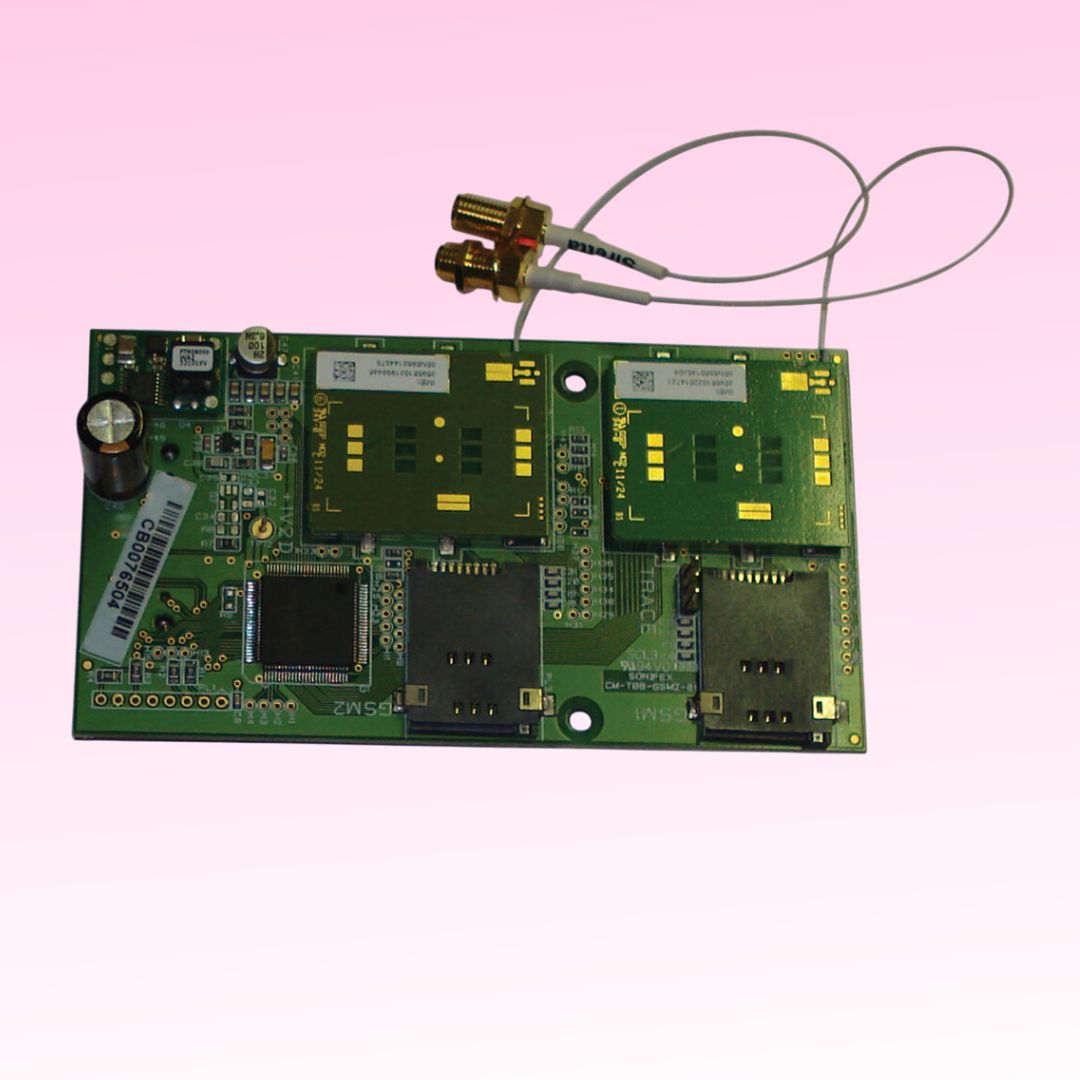 Top view of Sonifex CM-TBG expansion card on pink background