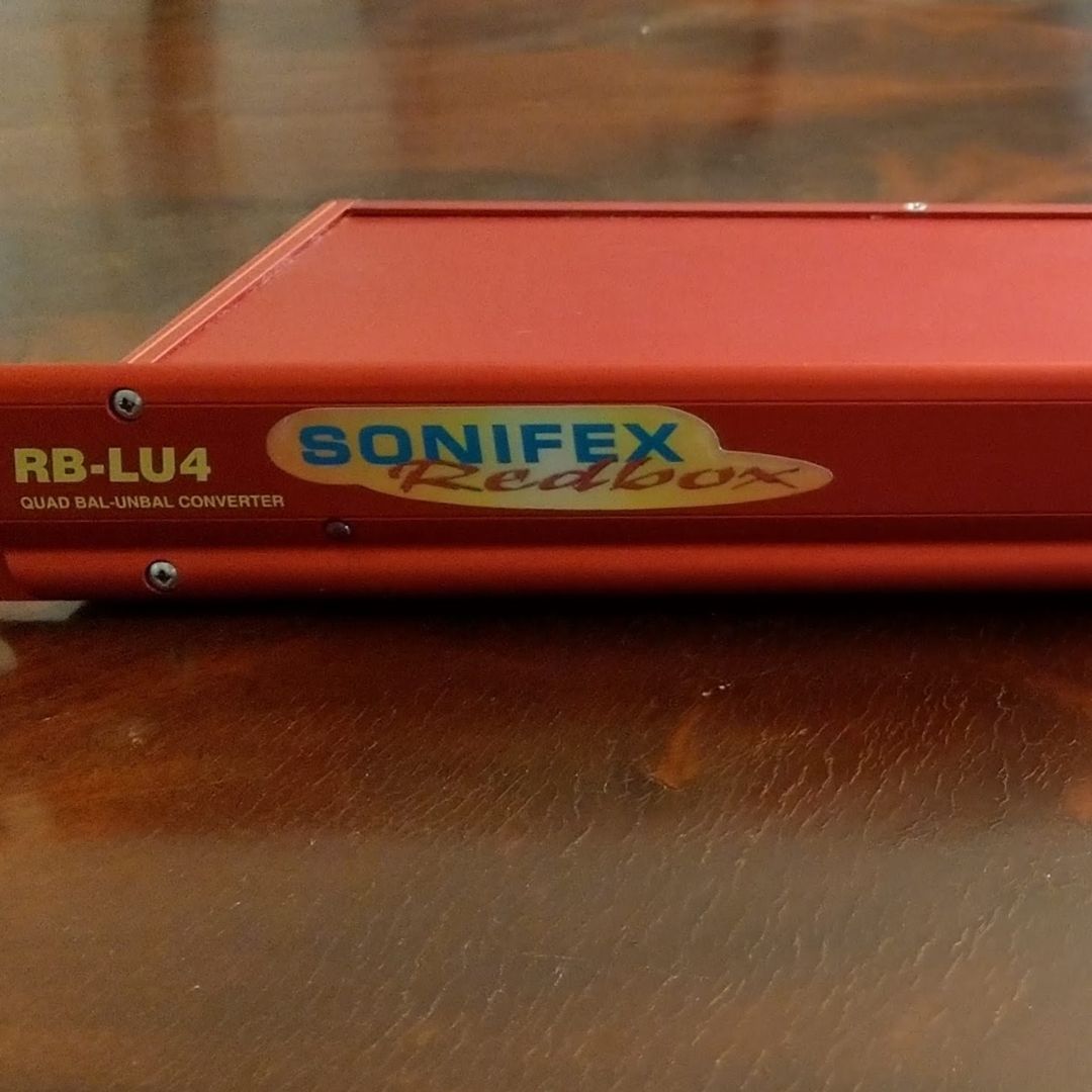 Close up of front panel of Sonifex RB-LU4 on wooden table