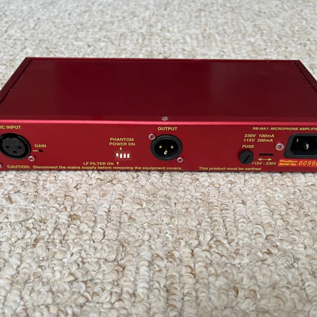 Top view of the rear panel of Sonifex RB-MA1 on a beige carpet