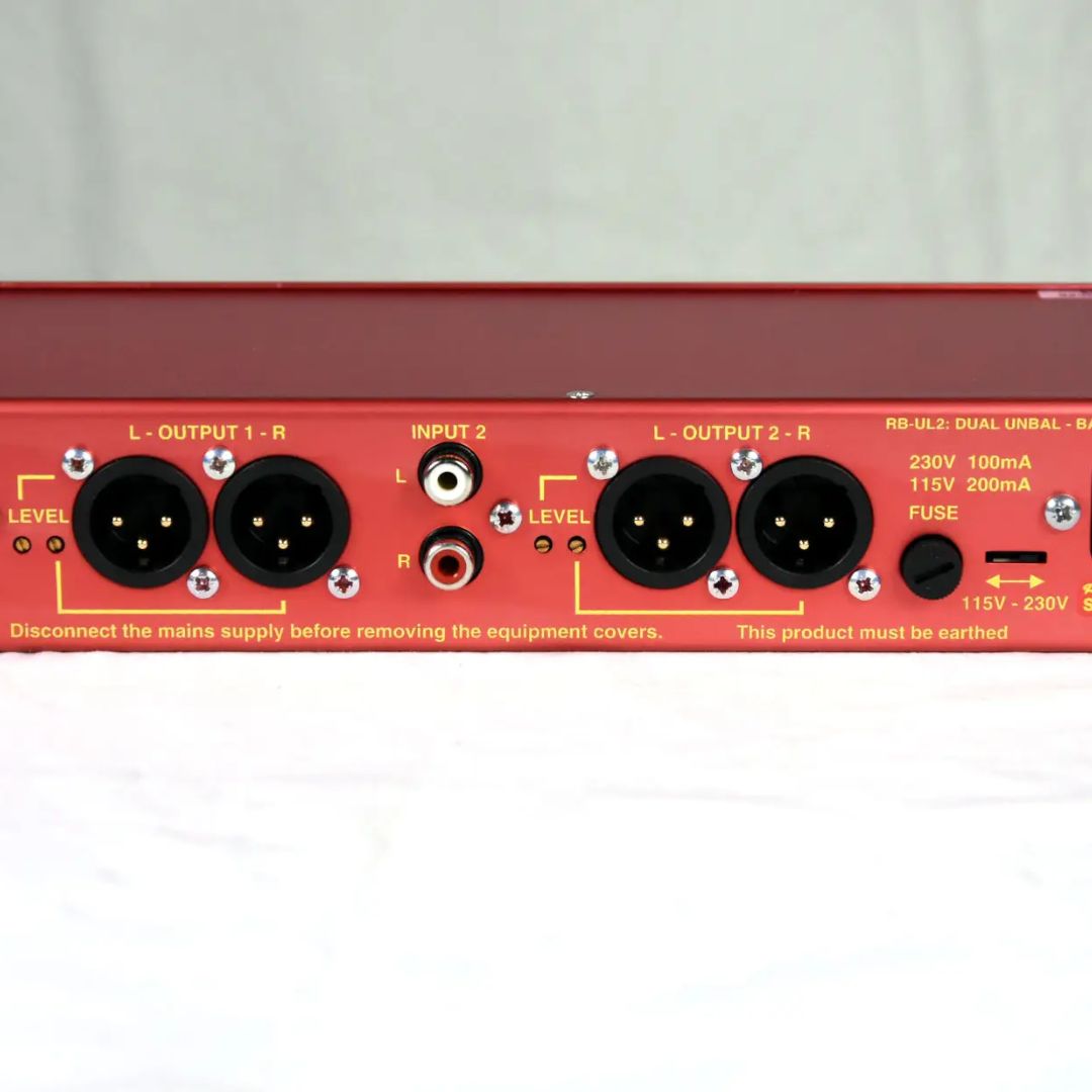 Close up shot of front panel of Sonifex RB-UL2 on white desk and grey background