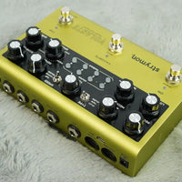 Angled rear view of Strymon Volante on grey fur rug