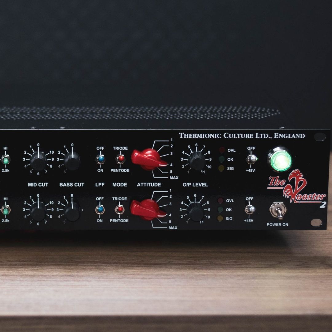 Close up of black rackmount effect on top of wooden table with black background