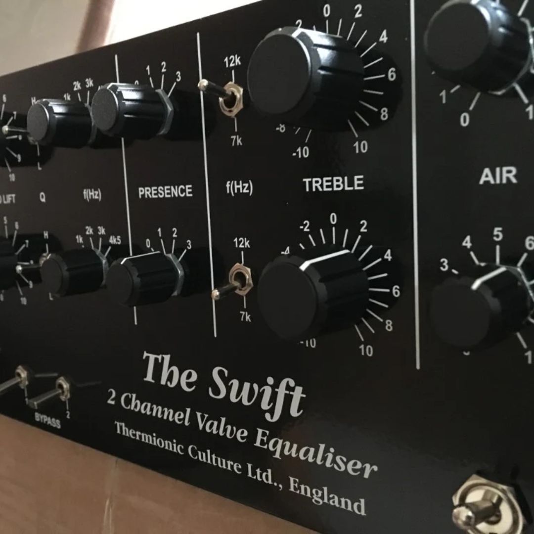 Close up of knobs of a rackmount effect on top of table