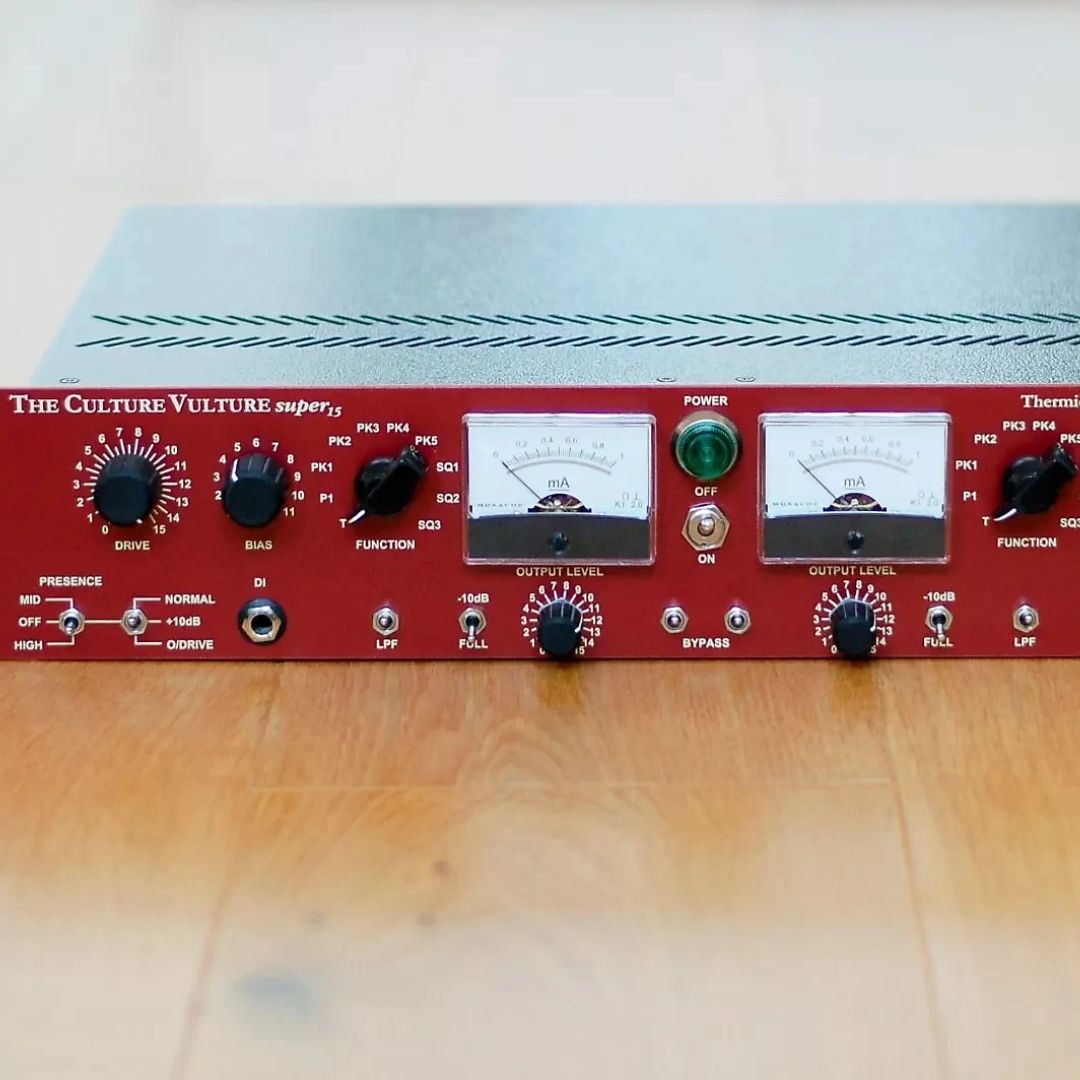 Close up of front of red rackmount effect on top of wooden flooring