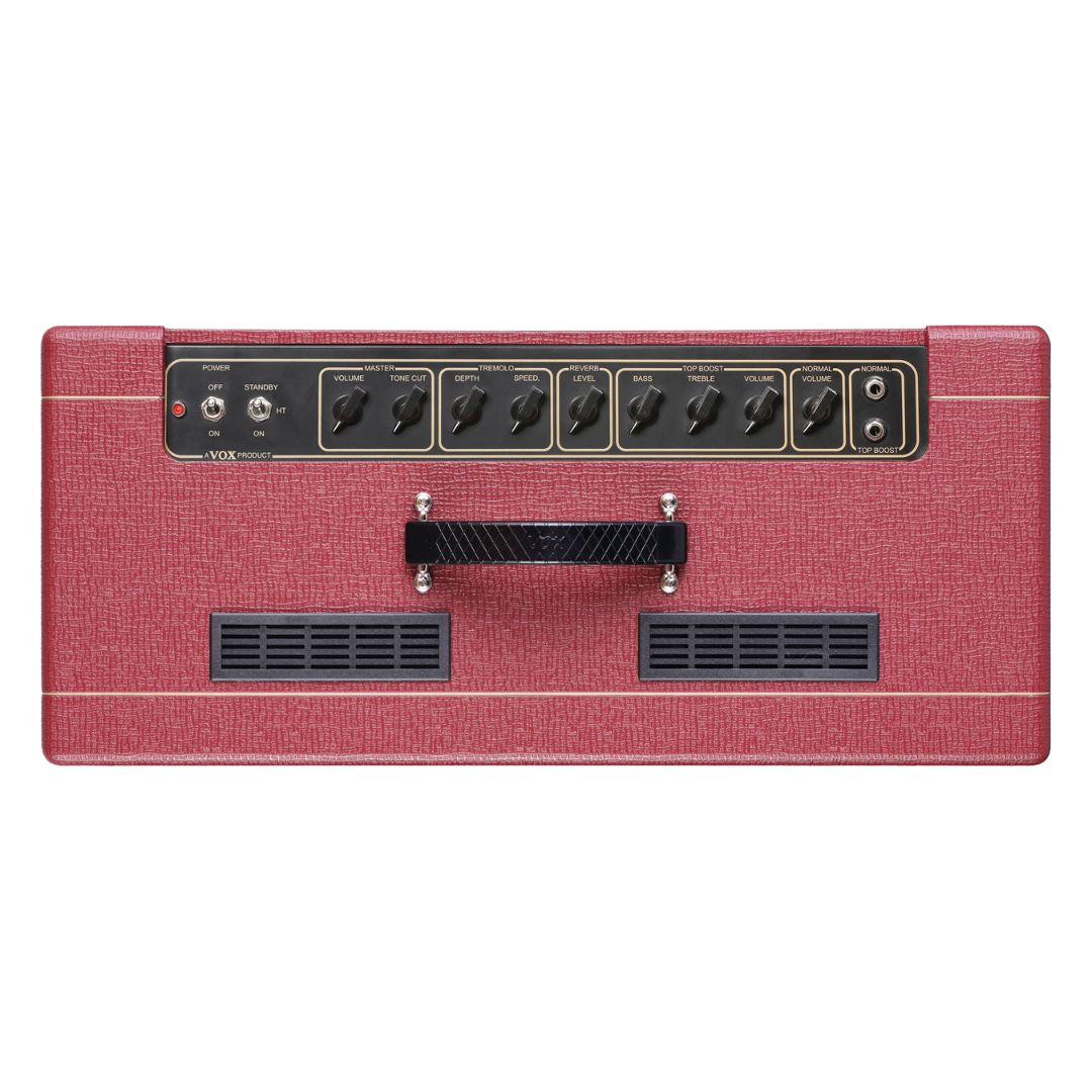 Top view of Vox AC15 Custom Tube Guitar Amplifier Classic Vintage Red on white background