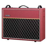Angled view of Vox AC30 Custom Valve Guitar Amplifier Classic Vintage Red on white background