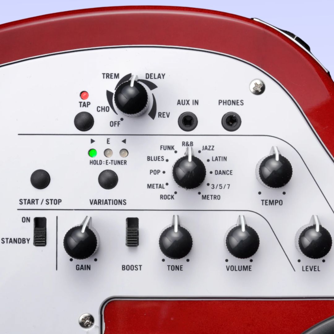 Close up view of Vox APC-1 Electric Guitar Metallic Red built-in effects on purple background