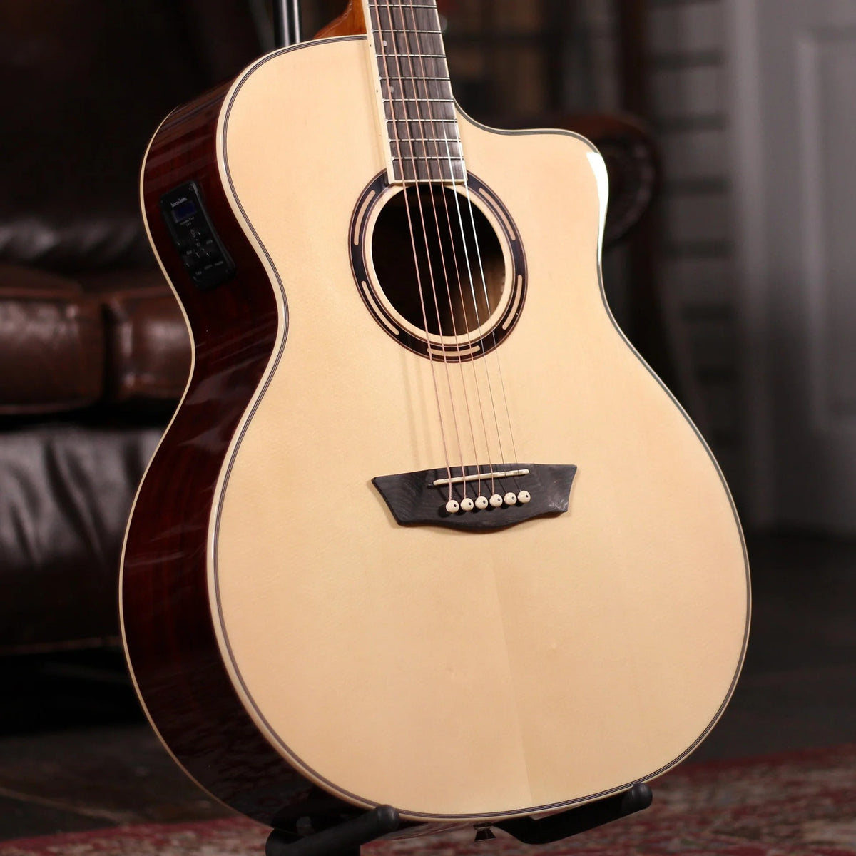 Angled close up view of Washburn AG70CE Apprentice Series Acoustic Electric Guitar in studio